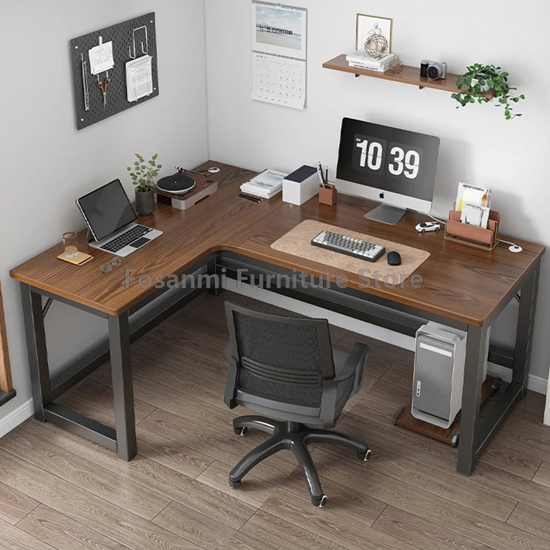 L-shaped gaming desk with computer setup, ergonomic chair, and organized workspace for productivity.